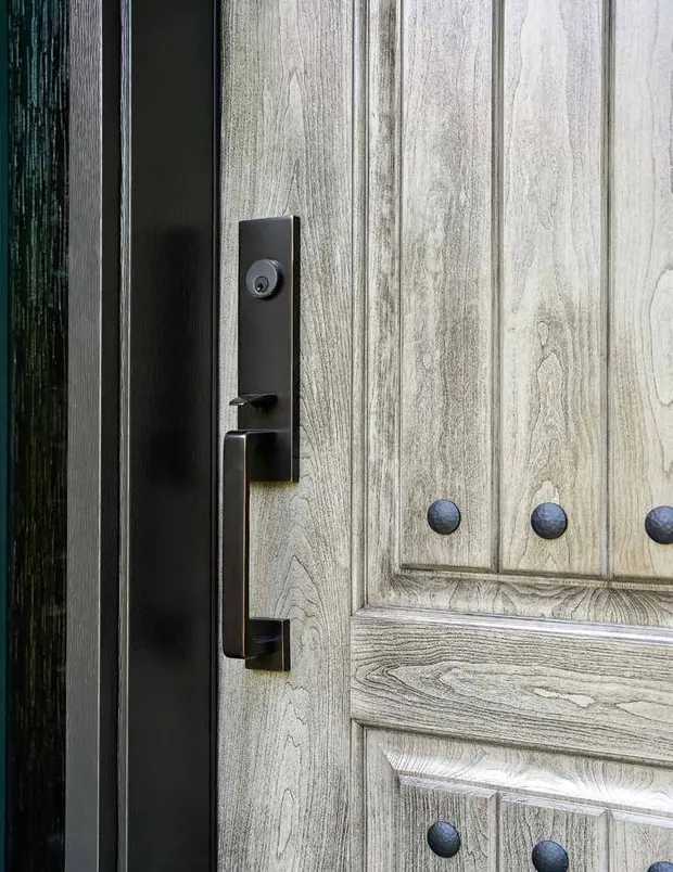 Emtek hardware on a Signet cherry entry door with clavos